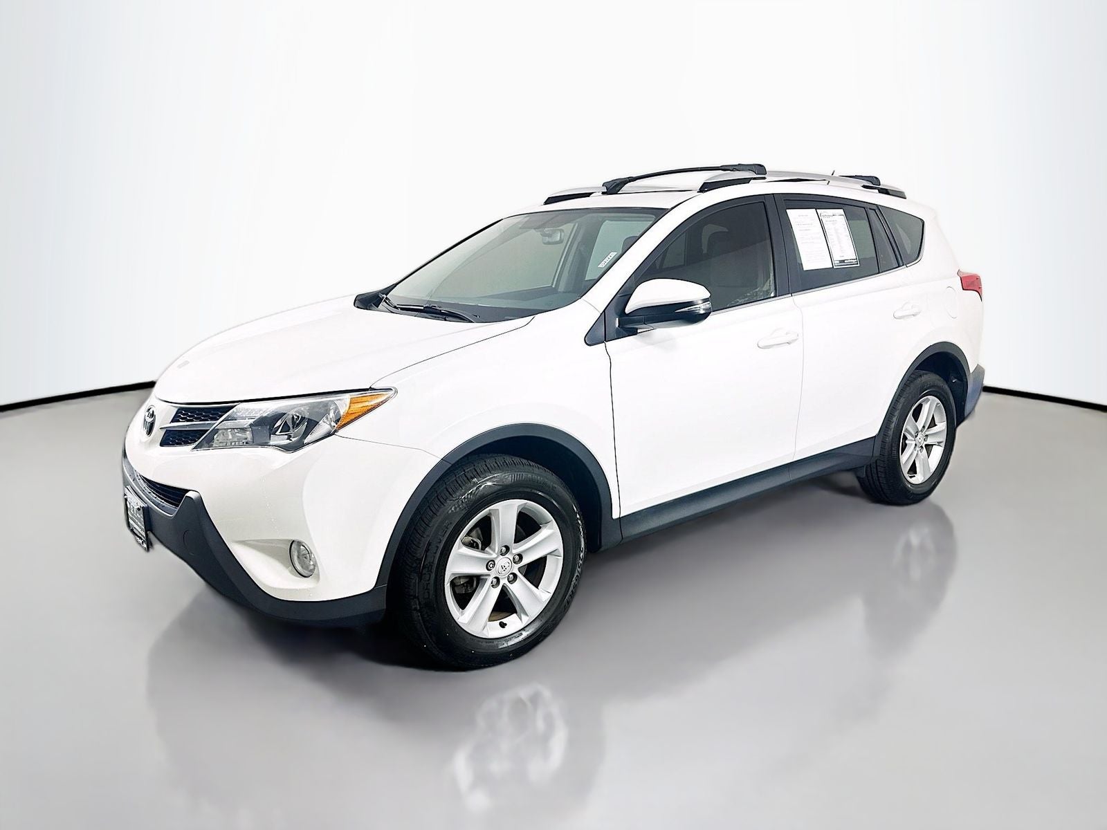 2014 Toyota RAV4 — rear three-quarter view