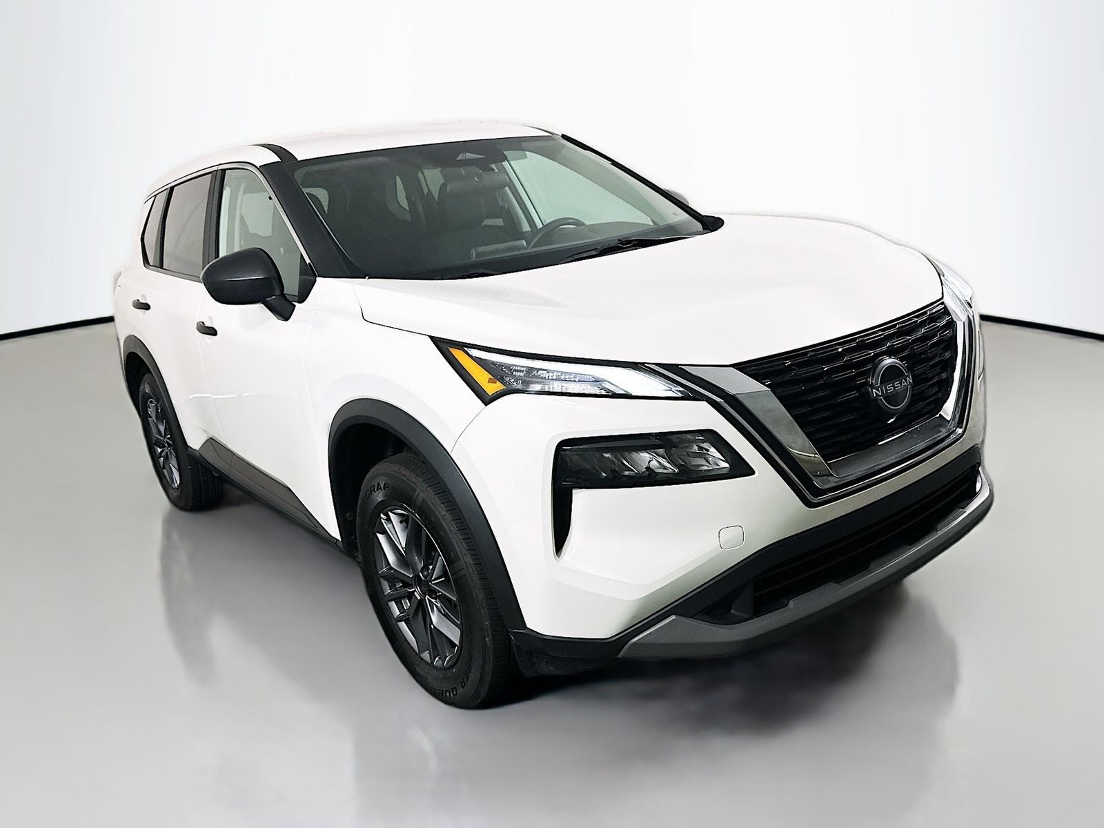 2023 Nissan Rogue S in Glacier White — front three-quarter view