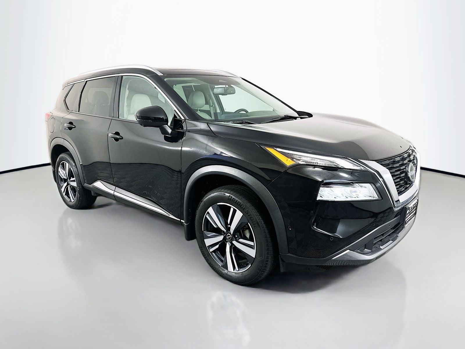 2023 Nissan Rogue SL in Super Black — front three-quarter view