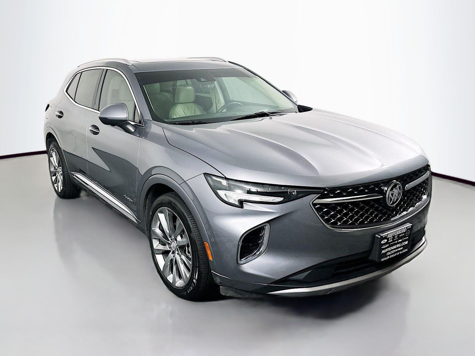 2022 Buick Envision Avenir in Satin Steel Metallic — front three-quarter view